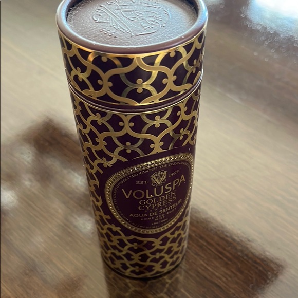 Voluspa Golden Cypress Aqua Candle with Black and Gold Design - Picture 3 of 3